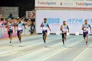 South African Anaso Jobodwana wins Final Men Senior 150m against American sprinter Justin Gatlin and Simon Magakwe during the 2018 Liquid Telecom Athletix Grand Prix Series at Tuks Stadium on March 08, 2018 in Pretoria.
