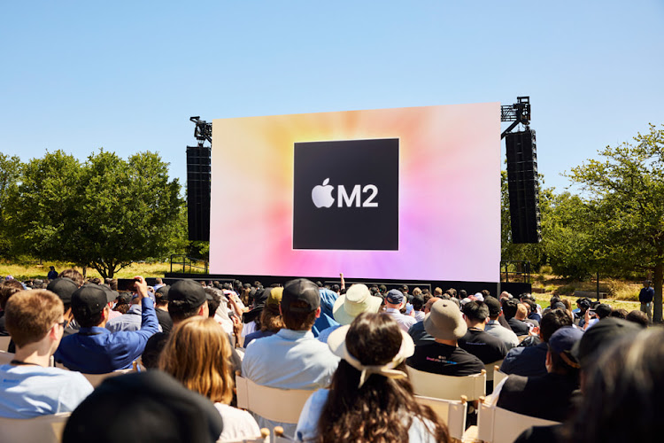 Developers watch the unveiling of M2, beginning the next generation of Apple silicon designed specifically for the Mac, at Apple Park.