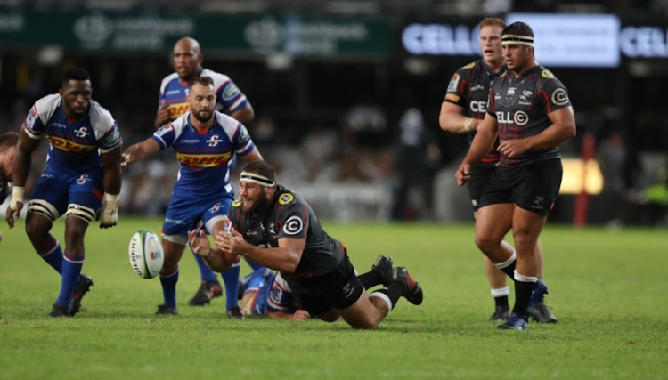 Thomas du Toit of the Cell C Sharks with a dive pass during the Super Rugby match between Cell C Sharks and DHL Stormers at Jonsson Kings Park on April 21, 2018 in Durban, South Africa.