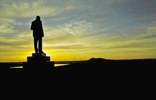 A statue of former prime minister Hendrik Verwoerd above the 'Afrikaanertuiste' town of Orania. He is known as 'the architect of apartheid' but his grandson joined the ANC to fight for a free South Africa