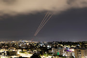 An anti-missile system operates after Iran launched drones and missiles towards Israel, as seen from Ashkelon, Israel, on April 14 2024. File photo.