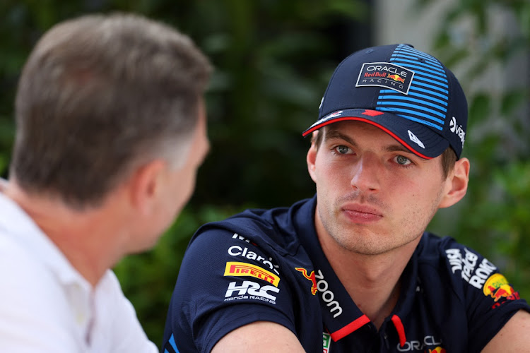 Red Bull's Max Verstappen with team principal Christian Horner ahead of the Australian Grand Prix at Melbourne Grand Prix Circuit, Melbourne, Australia, on March 21 2024. Picture: MARK PETERSON/REUTERS