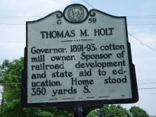Governor, 1891-93; cotton mill owner. Sponsor of railroad development and state aid to education. Home stood 350 yards S.Plaque via North Carolina Highway Historical Marker Program, and is used...