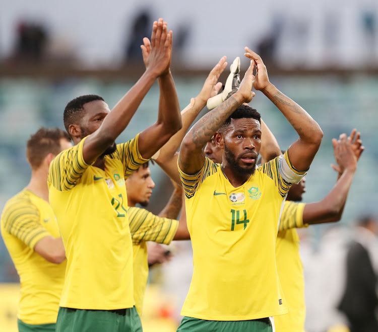 Thulani Hlatshwayo of South Africa and teammates thanking the fans during the 2019 African Cup Of Nations Qualifier match between South Africa and Libya at the Moses Mabhida Stadium, Durban on 08 September 2018.