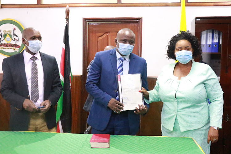 Nairobi County Assembly Speaker Benson Mutura , Dandora Three MCA Charles Thuo and ODM Party's Nominated MCA Catherin Okoth at County assembly on December 2, 2020.