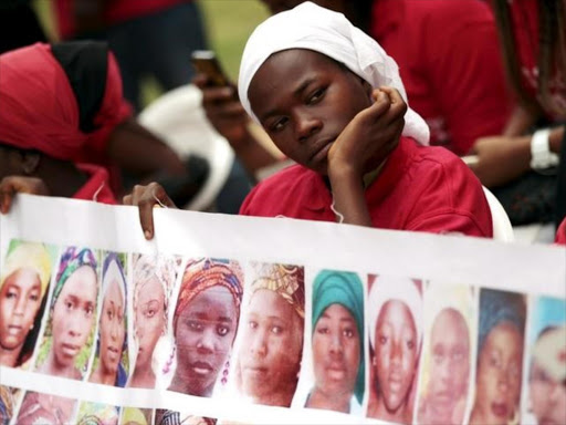 Bring Back Our Girls (BBOG) campaigners look on during a protest procession marking the 500th day since the abduction of girls in Chibok, along a road in Abuja August 27, 2015. Photo/REUTERS
