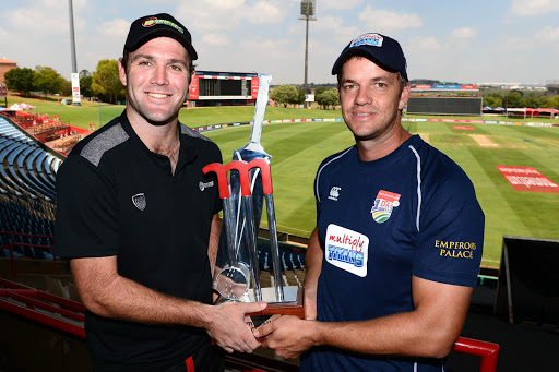 Jon-Jon Smuts of the Warriors and Albie Morkel of the Titans with the trophy during the Momentum One Day Cup Final Media Briefing at SuperSport Park on March 30, 2017 in Pretoria, South Africa.