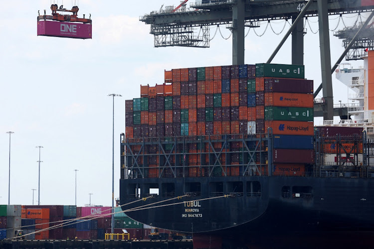 A docked cargo ship is loaded with shipping containers. File photo: MIKE SEGAR/REUTERS