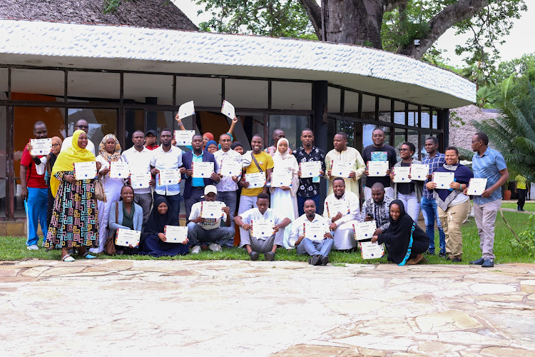 A section of journalists in a group photo at the Safari Beach Hotel in Kwale county on Friday, April 19, 2024.