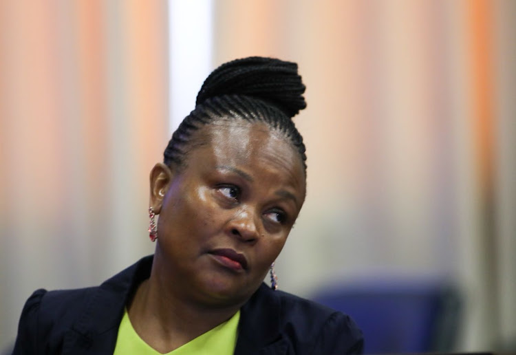 Busisiwe Mkhwebane's public battle with two former Sars officials shows no signs of ending.
