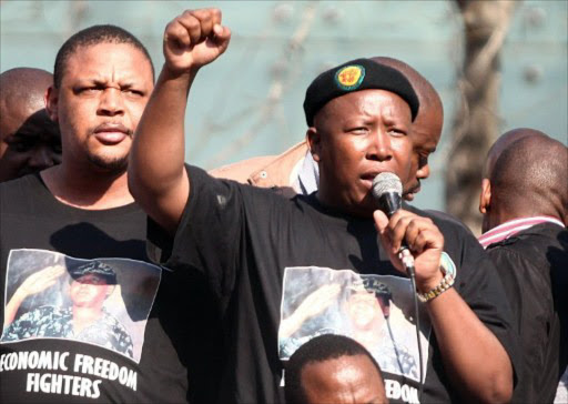 ANCYL president Julius Malema addresses the crowd on August 30 2011 outside Luthuli house in Johannesburg during his disciplinary hearing. File photo.