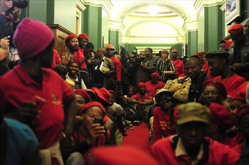 EFF members along with their leader Julius Malema staged a sit-in inside the legislature. Photo: Thulani Mbele.