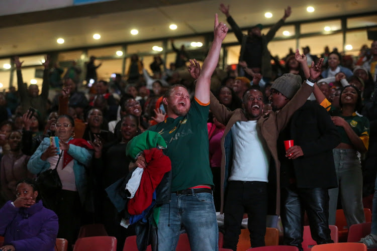 Springbok supporters watching the Rugby World Cup final at Nelson Mandela Bay stadium in Gqeberha cheer during the match. Picture: WERNER HILLS