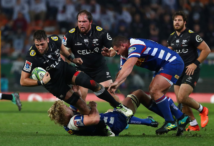 The Cell C Sharks captain Ruan Botha is tackled by by Pieter-Steph du Toit of the DHL Stormers during a Super Rugby match at Newlands Stadium, Cape Town on July 7 2018.