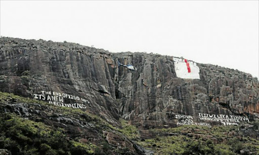 BOLD MESSAGE: The writing on the wall on a mountain behind the Mancoba Seven Angels Ministries at Nyanga Village near Ngcobo. It is in this church that seven suspects were shot dead. Picture: LULAMILE FENI