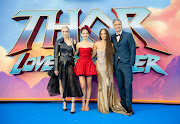 'Thor: Love and Thunder' cast members Pom Klementieff, Natalie Portman and Tessa Thompson with director Taika Waititi at the UK premiere of the movie.