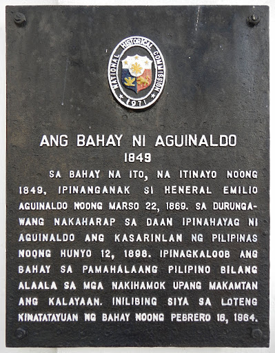 Sa bahay na ito, na itinayo noong 1849, ipinanganak si Heneral Emilio Aguinaldo noong Marso 22, 1869. Sa durungawang nakaharap sa daan ipinahayag ni Aguinaldo ang kasarinlan ng Pilipinas noong...