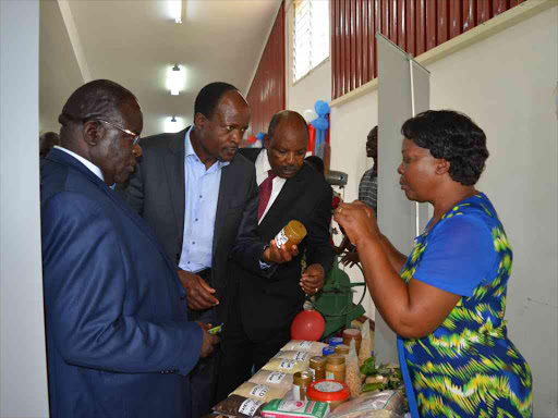 Governor Okoth Obado and USAID Mission Director Karen Freeman during Artificial Insemination programme launch at Kanyasrega Chief's Camp in Migori County on May 12,2016/MAURICE ALAL