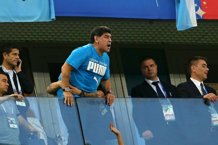 Diego Armando Maradona shows his support from the stands during the 2018 FIFA World Cup Russia group D match between Nigeria and Argentina at Saint Petersburg Stadium on June 26, 2018 in Saint Petersburg, Russia.