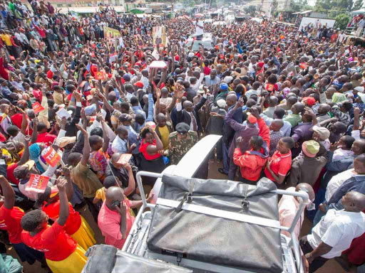 Jubilee Party supporters listen to President Uhuru Kenyatta during his tour of Nyamira county, June 7, 2017. /PSCU