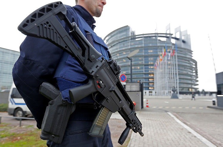 A French CRS policeman stands guard in front of the European Parliament in Strasbourg, France. France said on Monday it had foiled a terrorist plot and arrested seven people, a year after a state of emergency was imposed to counter a wave of Islamist attacks. REUTERS