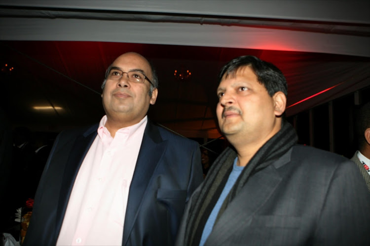 Oakbay Investments director Nazeem Howa and Atul Gupta.