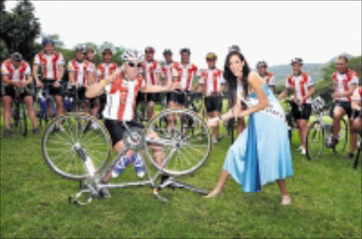 STYLISH SENDOFF: Miss South Africa Tatum Keshawar wished the cyclists good luck before the start of the gruelling seven day race to Cape Town. 27/02/09. Pic. Vaathiswa Ruselo. © Sowetan.