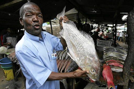 Jacinto Nhaposse is making a living by selling fish at a fish market at the Costa do Sol beach in Maputo.