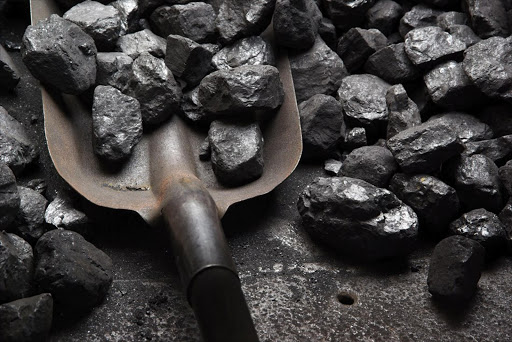 Shovel and coal. File photo.