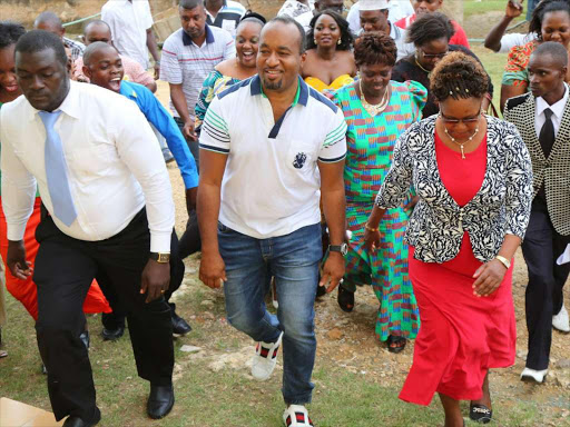Mombasa governor Hassan Joho (center) joins the faithfuls of Siloam Ministry Church in Mtopanga during the commemoration of their eleventh anniversary on Sunday.Photo GPS