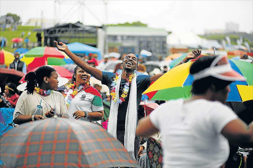 JOYOUS SOUNDS: Thousands of people from all corners of the country braved the rainy weather last year and headed to Buffalo Park Cricket stadium to watch some of the biggest names in South African music perform live during the seventh annual Buyel'Ekhaya Pan African Music Festival Picture: MARK ANDREWS