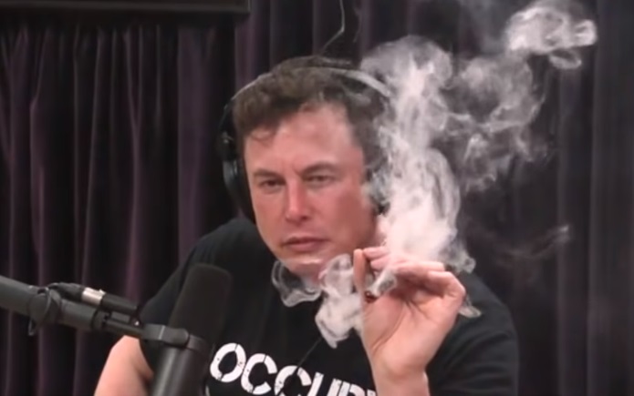 A screen grab of Elon Musk smoking weed on a webcast of the Joe Rogan Experience.