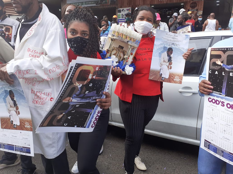 Supporters of self-proclaimed prophet Shepherd Bushiri outside the Pretoria specialised commercial crimes court where he appeared for charges of fraud, theft and money laundering.