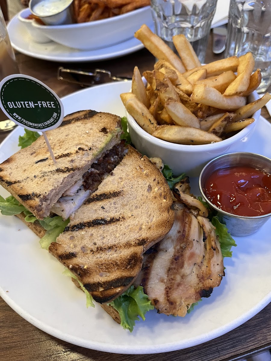 Grilled chicken sandwich with herb fries