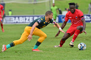 Kaizer Chiefs' Yusuf Maart and Chippa United's Bienvenu Eva Nga challenge for the ball in the DStv Premiership match at Buffalo City Stadium in East London on Saturday.