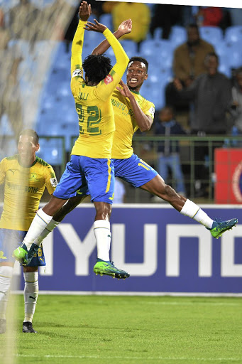 Percy Tau celebrates with goalscorer Themba Zwane in Sundowns' win against Wits at Loftus Versfeld Stadium at the weekend.