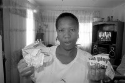 CONNED: Dimakatso Tlholo of Green Village in Soweto was defrauded of R12 000. Pic. Pat Seboko. 22/04/2007. © Sowetan.