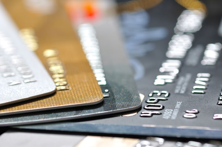 Try to pay off expensive credit card debt, but keep saving for the long term too. Picture: 123RF