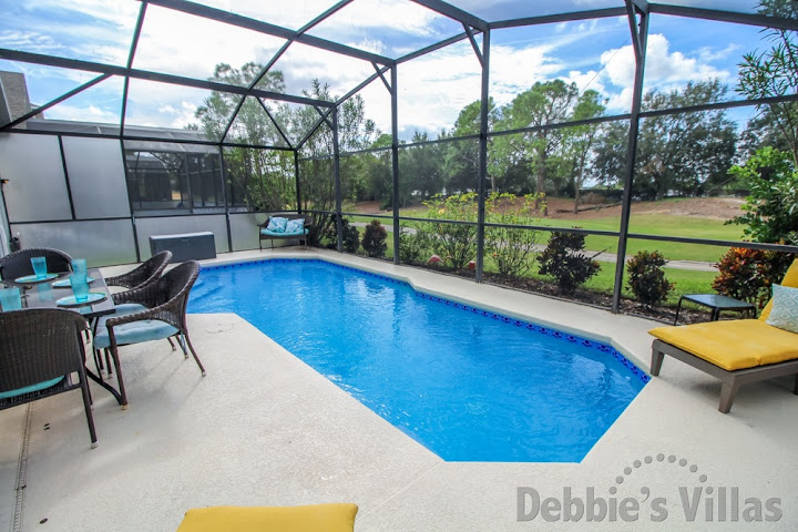 Golf course views from the west-facing private pool of this Southern Dunes vacation villa