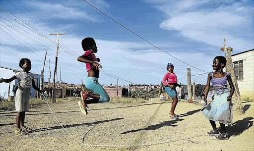 SCHOOL’S OUT: Sichumile Mtshange, Alilita Mtshange, Ababablwe Mthembu and Esihle Vezo have fun skipping in Nompumelelo Picture: SIBONGILE NGALWA