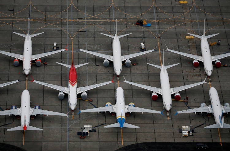 FILE PHOTO: Grounded Boeing 737 MAX aircraft are seen parked at Boeing facilities at Grant County International Airport in Moses Lake, Washington, U.S. November 17, 2020.