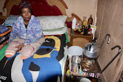 Beauty Qamata, 72, spends her days alone and immobile in her shack, with no toilet, running water or electricity. Photo: Mbulelo Sisulu