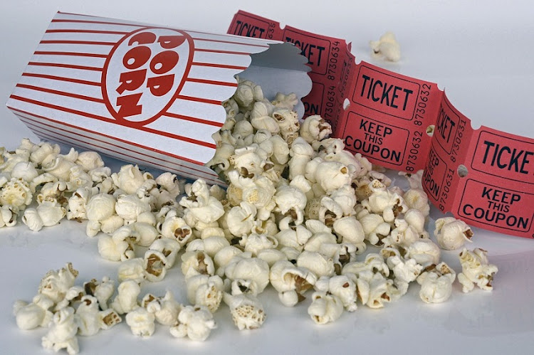 Popcorn with a movie ticket