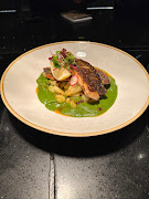 Pan-fried Cape Kobe with green pea gnocchi, chilli crisp and pickled radish by Chef Ofenste Morake for the Maslow, Sandton