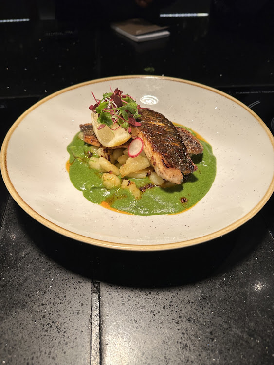 Pan-fried Cape Kobe with green pea gnocchi, chilli crisp and pickled radish by Chef Ofenste Morake for the Maslow, Sandton