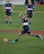 Jaco van der Walt of the Lions converts a penalty kick during the Absa Currie Cup match between Xerox Golden Lions and Vodacom Blue Bulls at Ellis Park on August 09, 2014 in Johannesburg, South Africa.