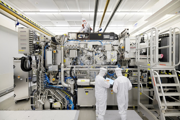 Employees work at ASML's semiconductor lithography tool project in Veldhoven, the Netherlands, April 4 2019. Picture: Bart van Overbeeke Fotografie/ASML/Reuters