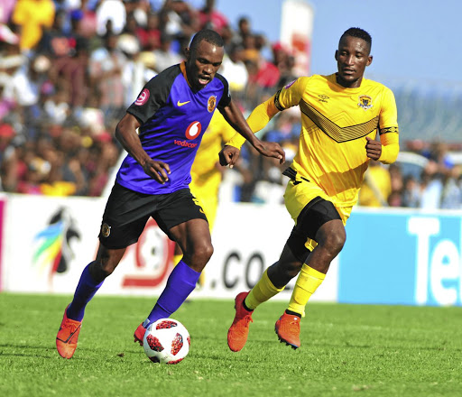 Chiefs striker Bernard Parker weaves past Tshwarelo Bereng of Leopards during their match at Thohoyandou. They drew 1-1.