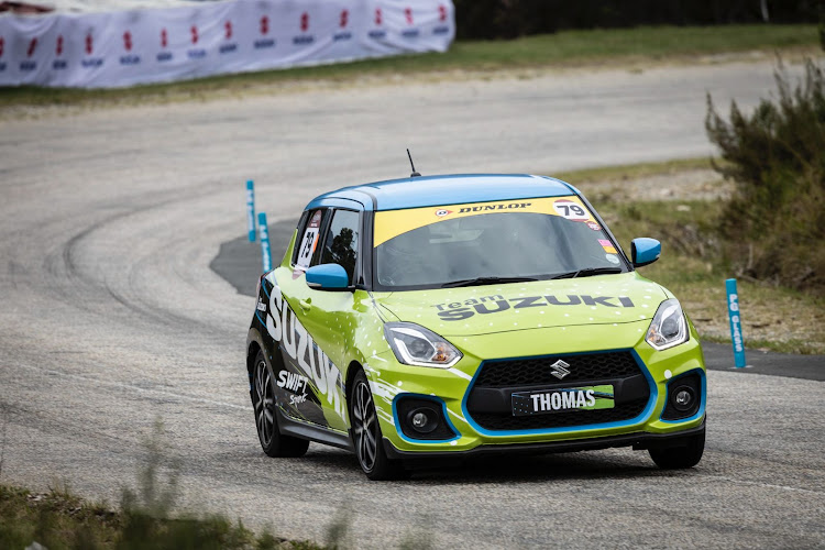 Falkiner putting his TimesLIVE Suzuki Swift Sport through its paces up the hill.