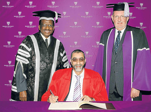 CARING: Gift of the Givers’ Dr Imtiaz Sooliman received an honorary degree from Rhodes yesterday. With him are vice-chancellor Dr Sizwe Mabizela, left, and Rhodes registrar Dr Stephen Fourie Picture: SUPPLIED